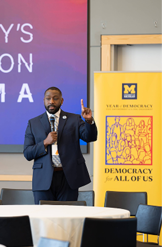 Speaker at a democracy event