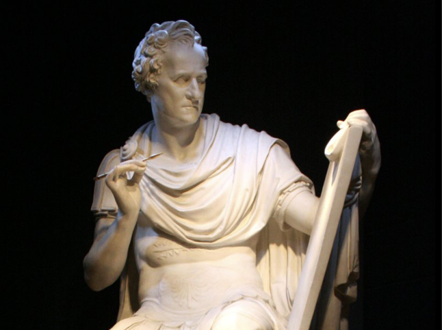 A statue of George Washington styled in Roman clothing and attire. 